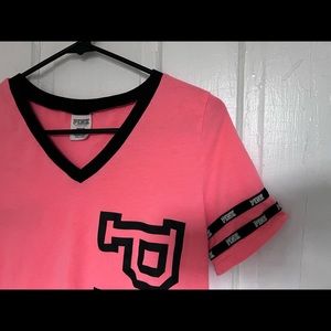 PINK Victoria’s Secret pink shirt.